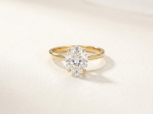 CASALYA Signature Oval Ring frontal studio view with oval moissanite and gold band